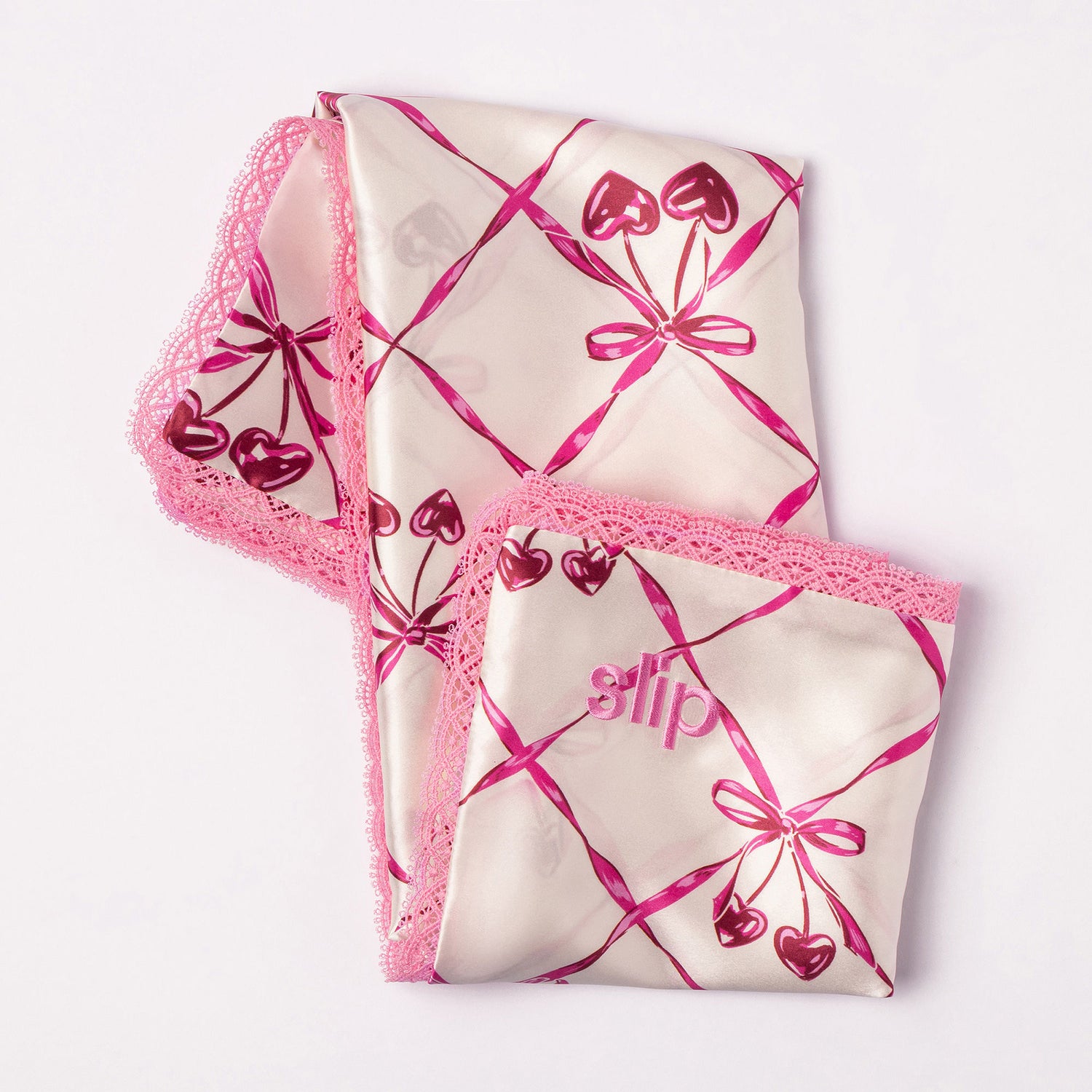 Top-view image of Slip Pure Silk Queen Pillowcase with Lace Trim (Limited Edition) variant: Sweet Cherry