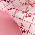 Lifestyle image of Slip Pure Silk Queen Pillowcase with Lace Trim (Limited Edition) variant: Sweet Cherry