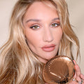 Model image of Charlotte Tilbury Airbrush Bronzer variant: Tan