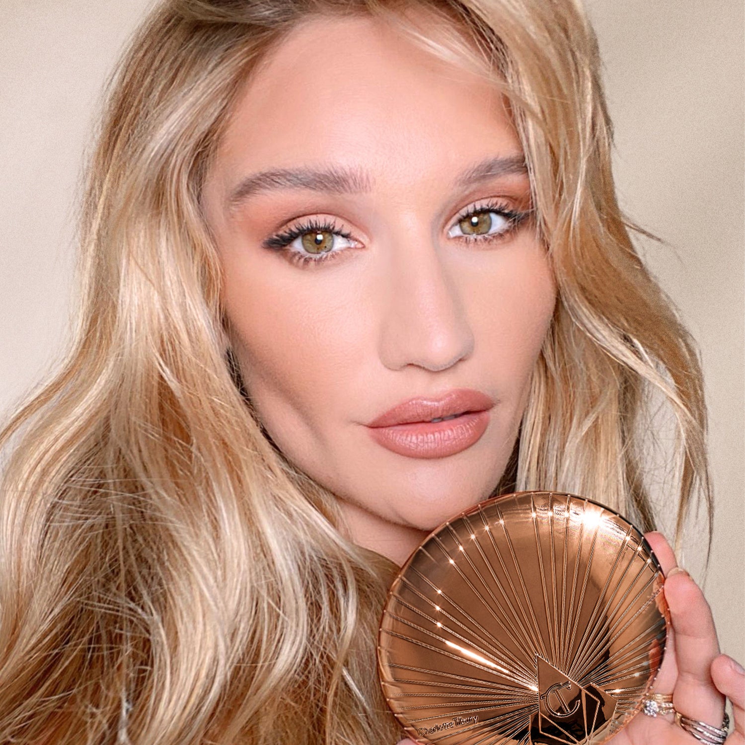 Model image of Charlotte Tilbury Airbrush Bronzer variant: Tan