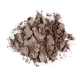 A pile of crushed, cool-toned brown Anastasia Beverly Hills Brow Powder Duo used for an ombré effect.