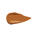 A smear of medium-tan Ogee Complexion Perfecting Concealer.