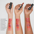 An arm swatch of Nars Explicit Lipstick variant: Unauthorized 863 (classic red)