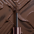 Swatch image of Hourglass Arch Brow Volumizing Fiber Gel variant: Warm Brunette