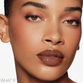 Model image of Nars Afterglow Lip Shine variant: What If