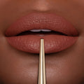Model image of Hourglass Confession Ultra Slim High Intensity Refillable Lipstick variant: YOU MAKE ME