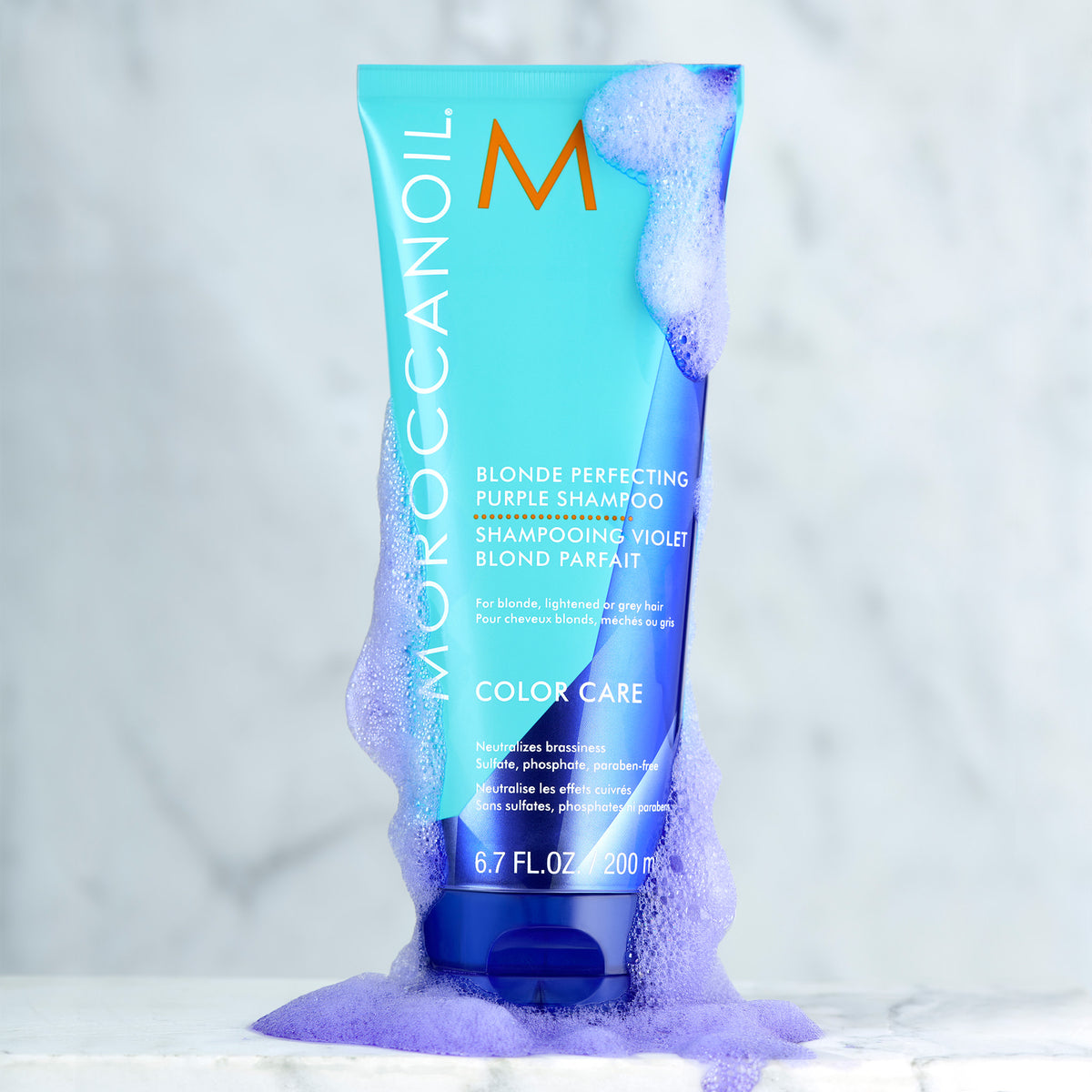 Moroccanoil Blonde Perfecting Purple Shampoo .