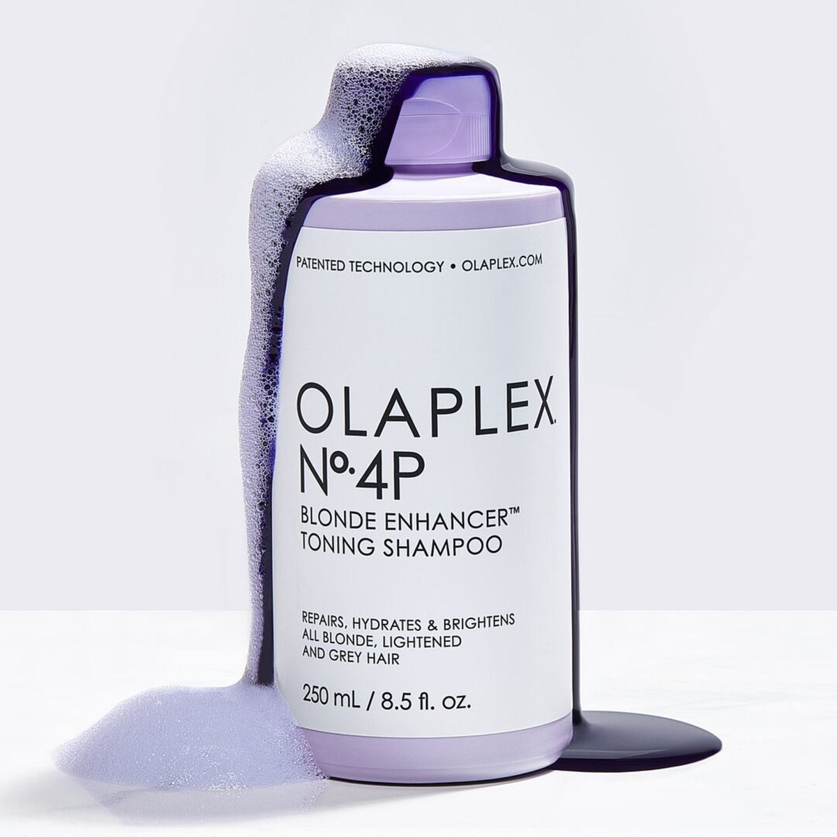 Olaplex No.4P Blonde Enhancer Toning Shampoo .