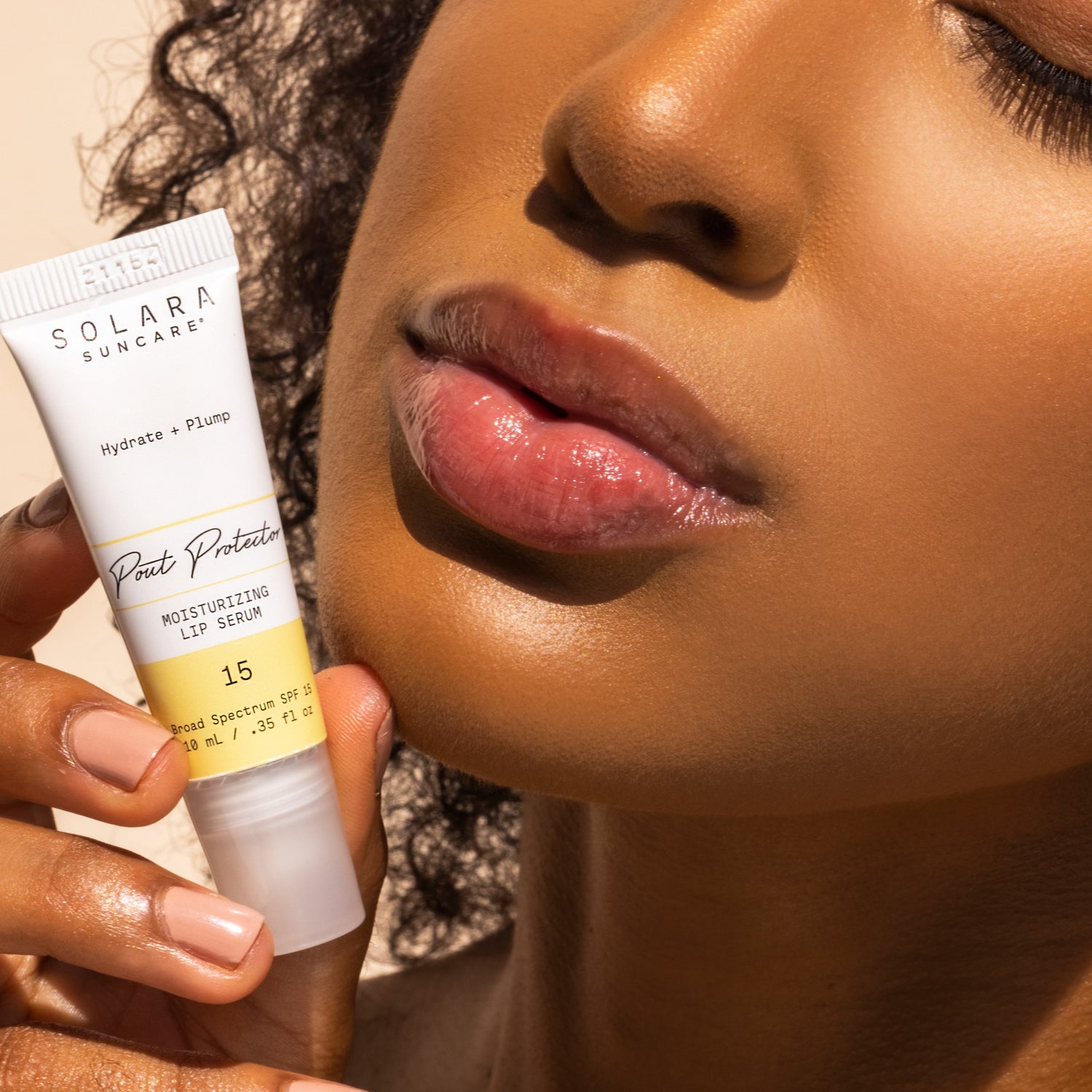 Solara Suncare Pout Protector Lip Serum SPF 15 model image .