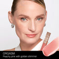 Nars Afterglow Lip Shine Color/Shade variant: Orgasm model image 2 . This product is in the color pink