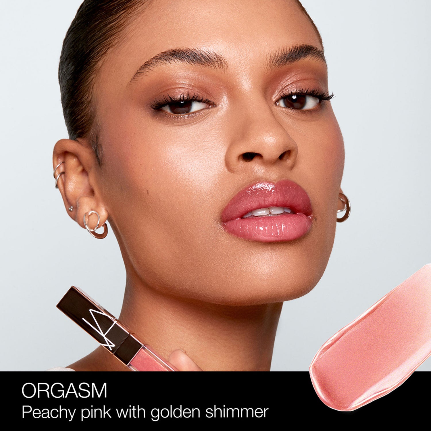 Nars Afterglow Lip Shine Color/Shade variant: Orgasm model image 3 . This product is in the color pink